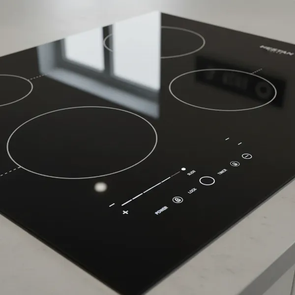 Close-up of the Hestan 36-inch induction cooktop's slide controls and cooking zones.